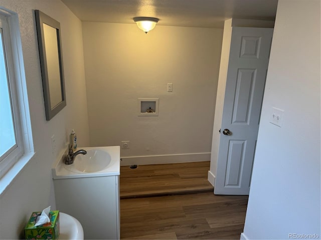 4807 Clayton St, Denver, CO 80216 - bathroom with vanity and wood finished floors