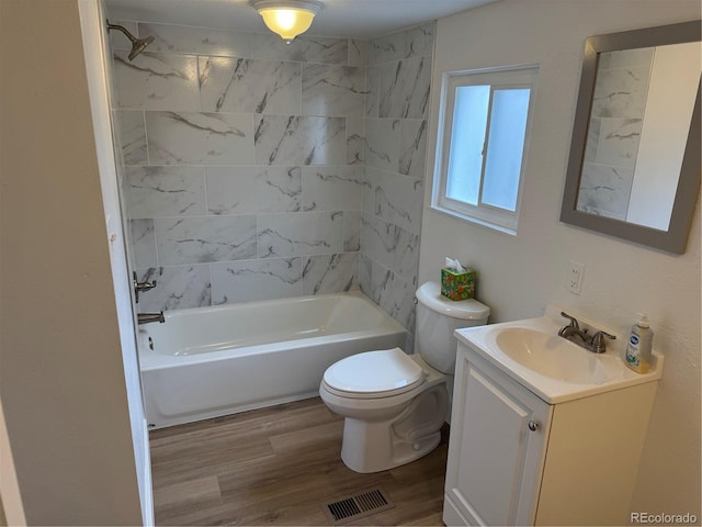 4807 Clayton St, Denver, CO 80216 - bathroom with vanity, wood finished floors, and shower / washtub combination