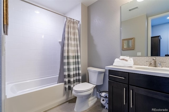 full bathroom with shower / tub combo with curtain, tile patterned flooring, toilet, backsplash, and vanity