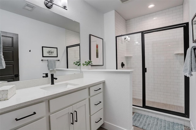 3436 W 154th Ave, Broomfield, CO 80023 - bathroom featuring vanity, a stall shower, and recessed lighting