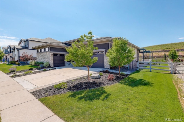 3436 W 154th Ave, Broomfield, CO 80023 - view of front of property with a garage, concrete driveway, stone siding, and stucco siding