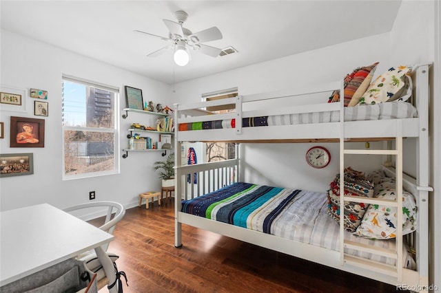 449 S Humboldt St, Denver, CO 80209 - bedroom with wood finished floors, baseboards, and a ceiling fan