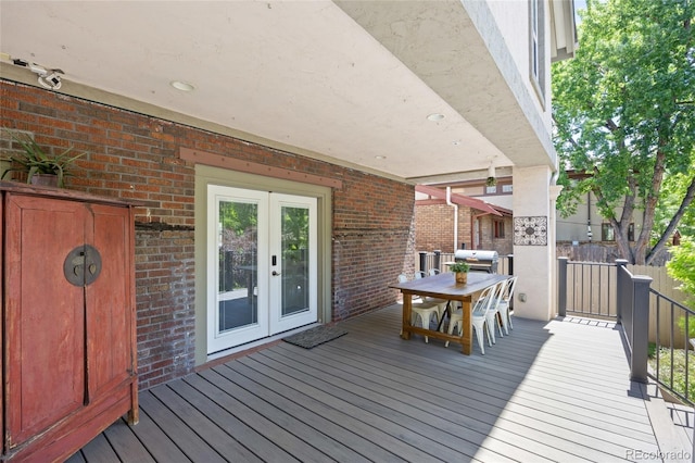 449 S Humboldt St, Denver, CO 80209 - wooden terrace with french doors, outdoor dining area, and area for grilling