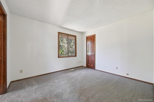 11210 Quivas Loop, Denver, CO 80234 - spare room featuring carpet and a textured ceiling