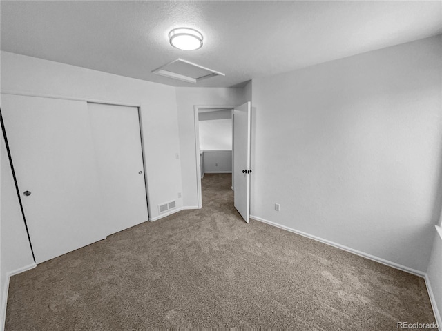 19093 E Linvale Pl, Aurora, CO 80013 - unfurnished bedroom with attic access, carpet flooring, and a closet