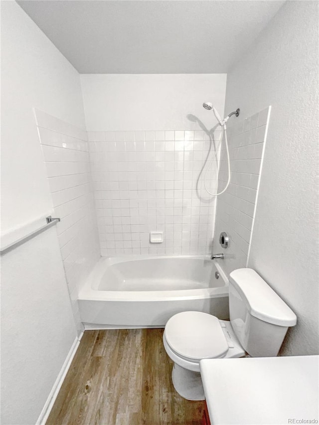 19093 E Linvale Pl, Aurora, CO 80013 - full bathroom featuring wood finished floors and shower / bath combination