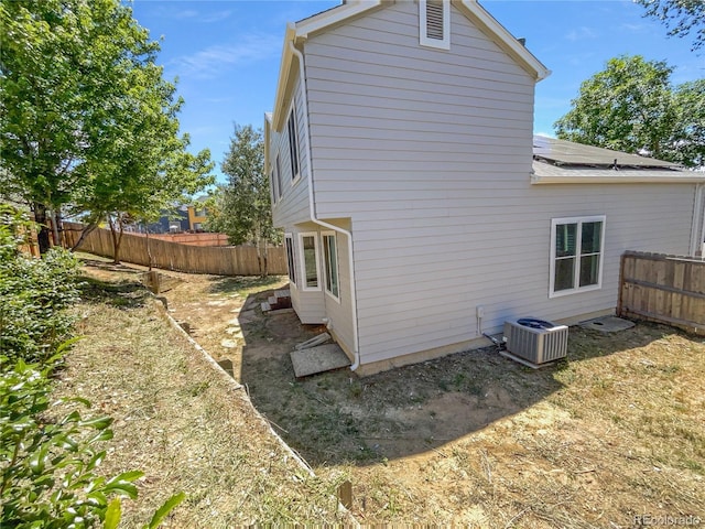 19093 E Linvale Pl, Aurora, CO 80013 - view of side of home featuring a fenced backyard and solar panels