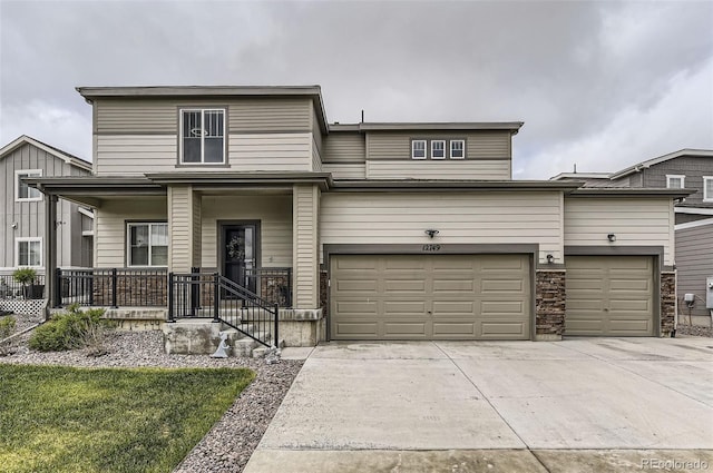 12749 Horton Ct, Parker, CO 80134 - view of front facade with concrete driveway and an attached garage