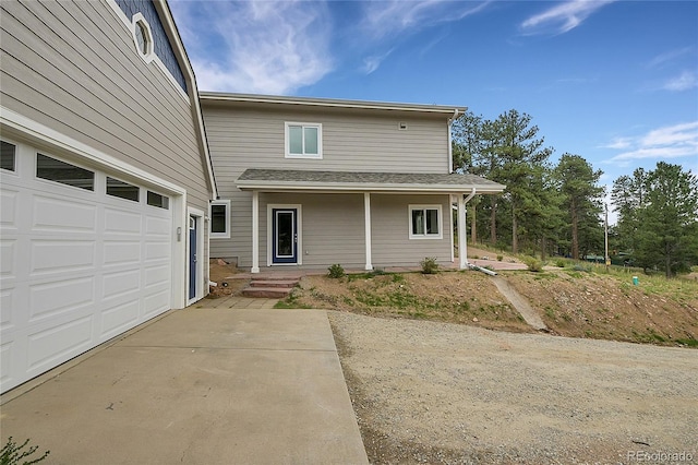 view of front of home with concrete driveway