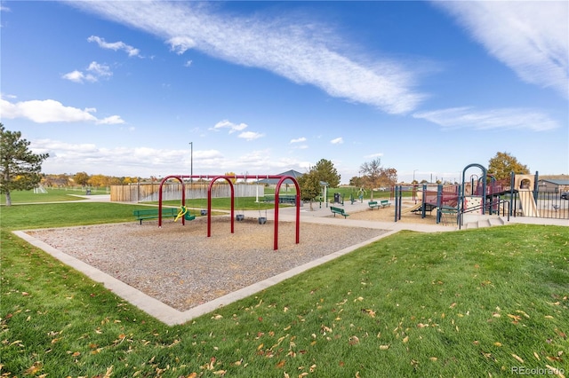 view of playground with a yard