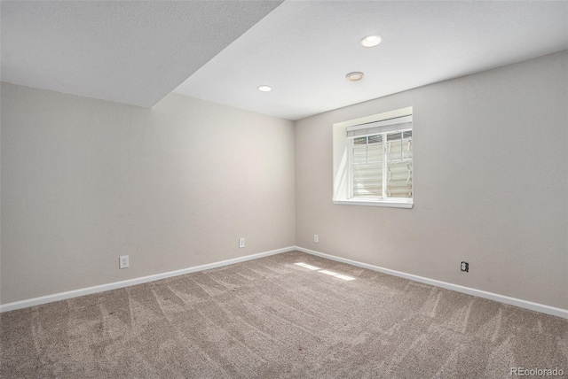 22002 E Irish Dr, Aurora, CO 80016 - carpeted empty room with baseboards and recessed lighting