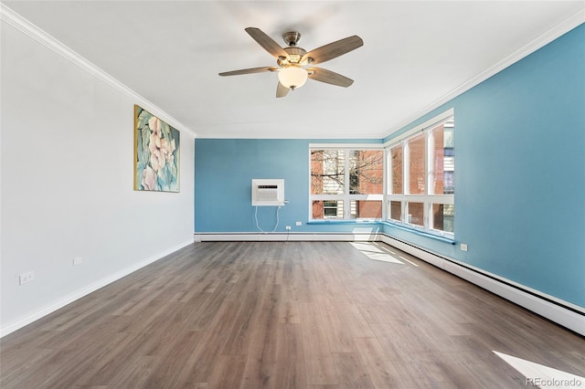 320 S Ames St Unit 5, Lakewood, CO 80226 - spare room with ornamental molding, a wall mounted air conditioner, ceiling fan, wood finished floors, and baseboard heating
