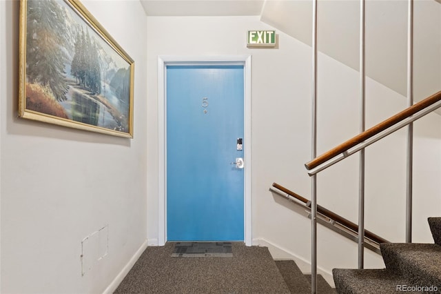 320 S Ames St Unit 5, Lakewood, CO 80226 - carpeted foyer with baseboards and stairway