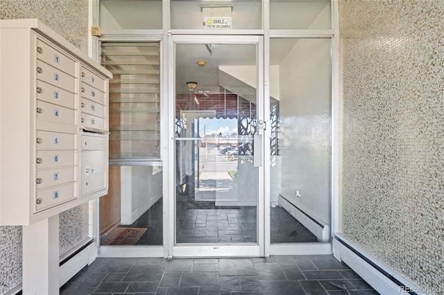 320 S Ames St Unit 5, Lakewood, CO 80226 - entrance to property with a baseboard radiator