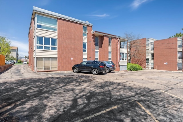 320 S Ames St Unit 5, Lakewood, CO 80226 - view of building exterior featuring uncovered parking