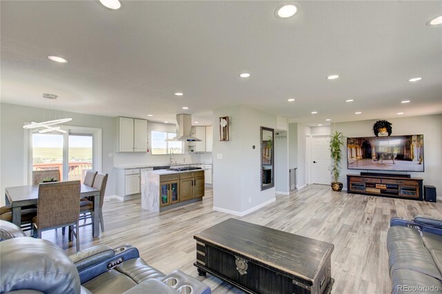45321 Summit Rd, Parker, CO 80138 - living room featuring light wood-style floors and recessed lighting