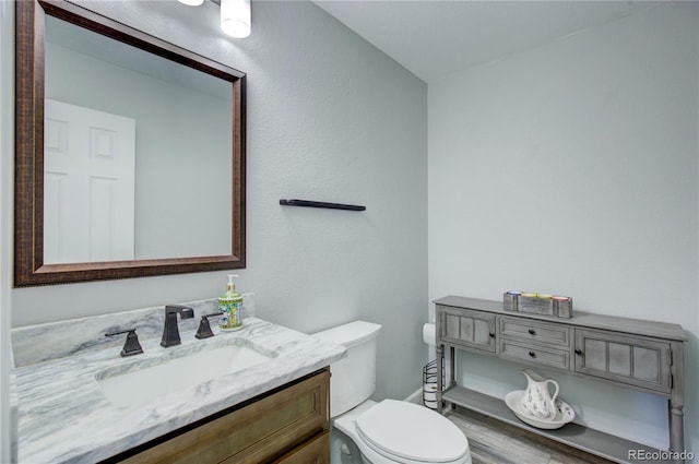 45321 Summit Rd, Parker, CO 80138 - half bath with vanity and wood finished floors