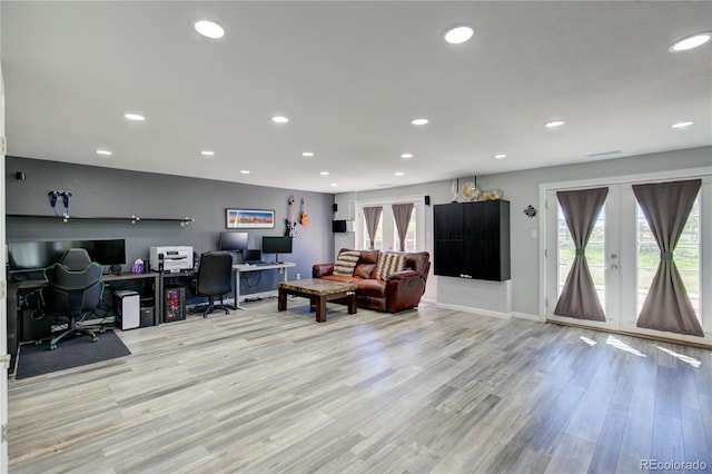 45321 Summit Rd, Parker, CO 80138 - living area with an office area, healthy amount of natural light, light wood-style floors, and recessed lighting