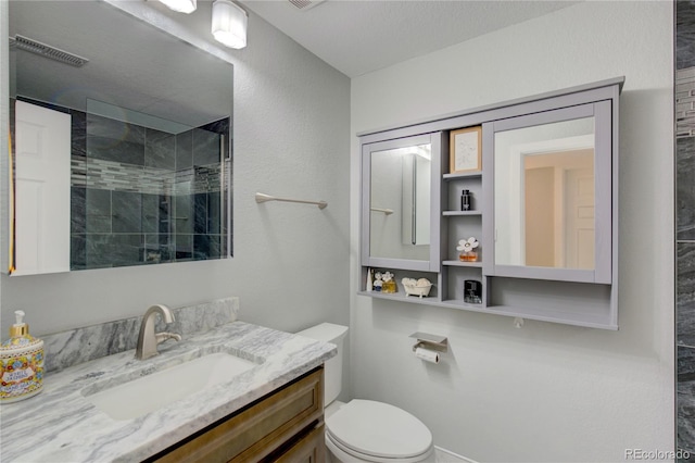 45321 Summit Rd, Parker, CO 80138 - bathroom featuring a tile shower and vanity