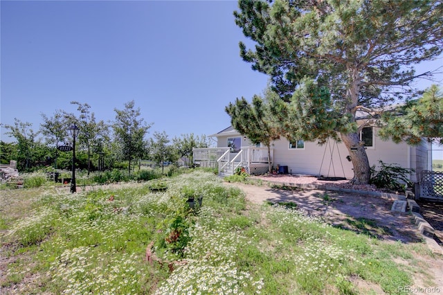 45321 Summit Rd, Parker, CO 80138 - view of yard with a deck