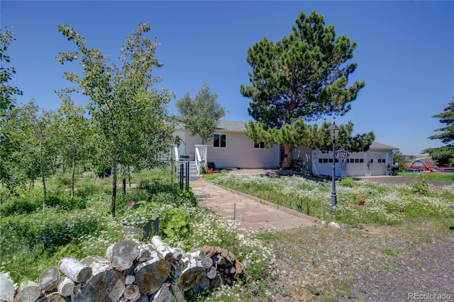 45321 Summit Rd, Parker, CO 80138 - view of front of home featuring an attached garage