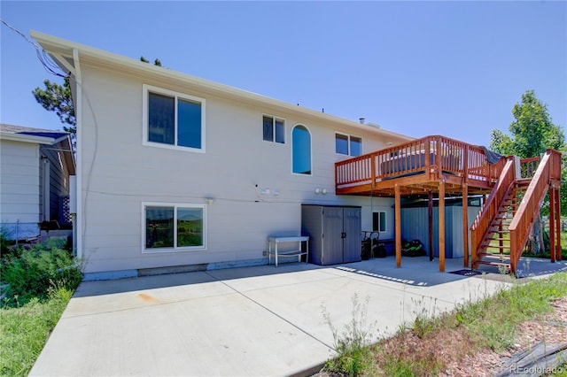 45321 Summit Rd, Parker, CO 80138 - rear view of property featuring a patio area, a deck, and stairs