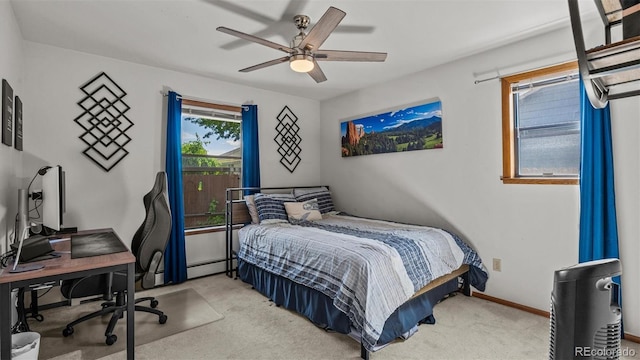 2923 Bonito Ave, Grand Junction, CO 81504 - carpeted bedroom with an office area, a baseboard radiator, baseboards, and ceiling fan