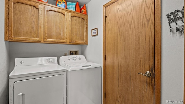 2923 Bonito Ave, Grand Junction, CO 81504 - laundry area featuring independent washer and dryer and cabinet space