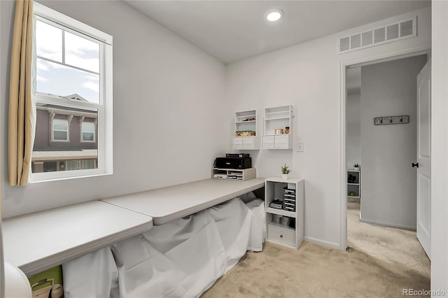 home office featuring baseboards, light colored carpet, recessed lighting, and visible vents
