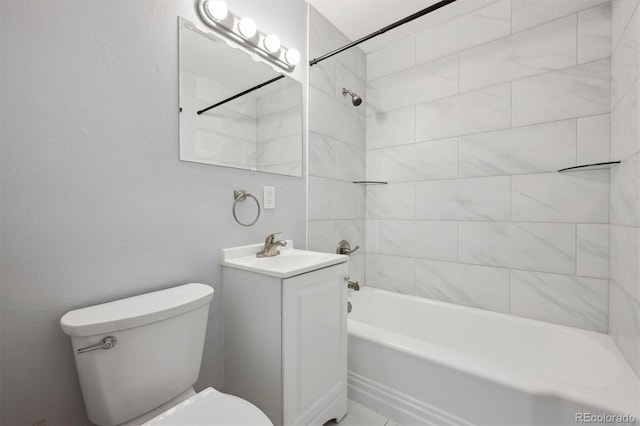 bathroom with shower / bathtub combination, vanity, and toilet