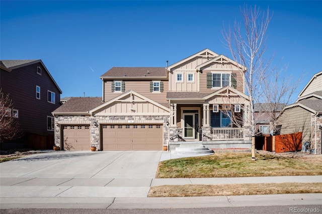 craftsman-style house with a porch, an attached garage, driveway, stone siding, and board and batten siding