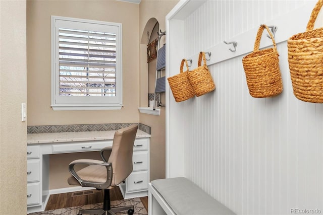 30 Stewart Way, Erie, CO 80516 - mudroom with built in study area and wood finished floors