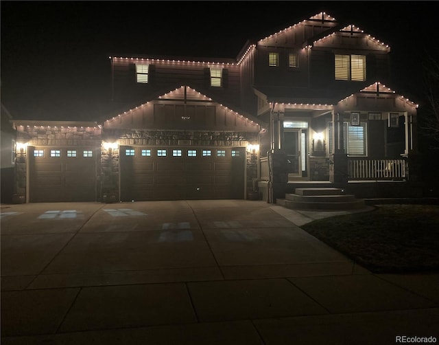 30 Stewart Way, Erie, CO 80516 - view of front of property featuring concrete driveway and board and batten siding