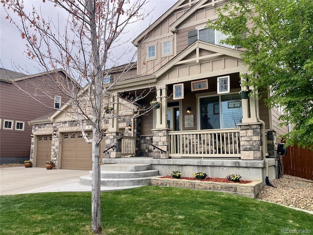 30 Stewart Way, Erie, CO 80516 - craftsman inspired home with board and batten siding, concrete driveway, stone siding, a porch, and a front lawn