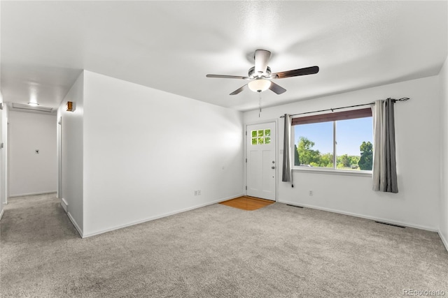 3118 E San Miguel St, Colorado Springs, CO 80909 - carpeted empty room with ceiling fan and baseboards