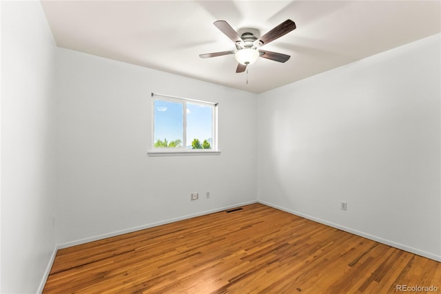3118 E San Miguel St, Colorado Springs, CO 80909 - unfurnished room featuring wood finished floors, baseboards, and ceiling fan