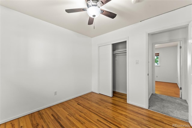 3118 E San Miguel St, Colorado Springs, CO 80909 - unfurnished bedroom featuring a closet, baseboards, wood finished floors, and ceiling fan