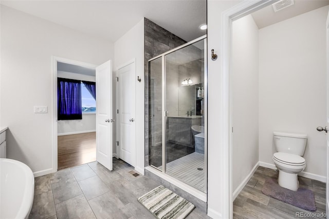 5651 Gore Creek Pl, Brighton, CO 80601 - full bathroom featuring a shower stall and toilet