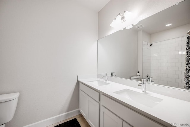 5651 Gore Creek Pl, Brighton, CO 80601 - full bath with double vanity and a shower with shower curtain