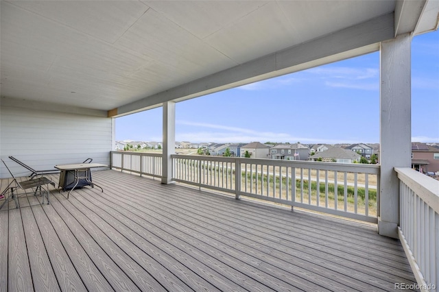 5651 Gore Creek Pl, Brighton, CO 80601 - wooden deck featuring a residential view