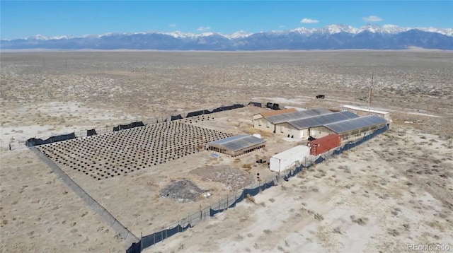 aerial view featuring view of desert and a mountain view