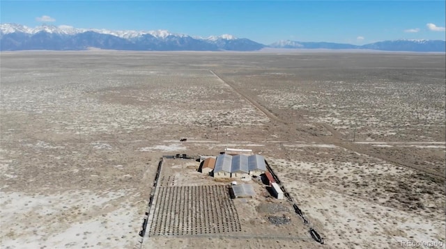 drone / aerial view featuring a mountain view