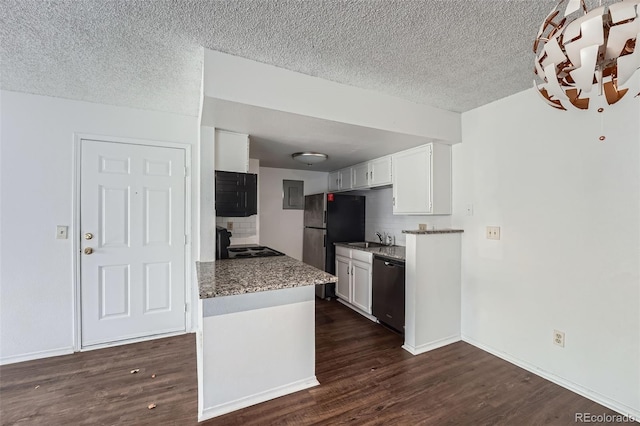 kitchen with dishwashing machine, dark wood-style floors, freestanding refrigerator, range with electric cooktop, and white cabinetry