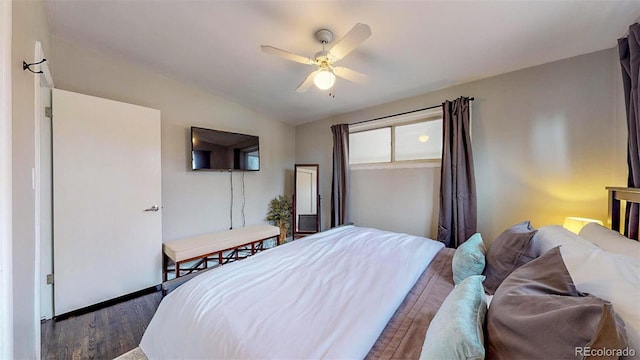 28 W Broadmoor Dr, Littleton, CO 80120 - bedroom with wood finished floors and ceiling fan