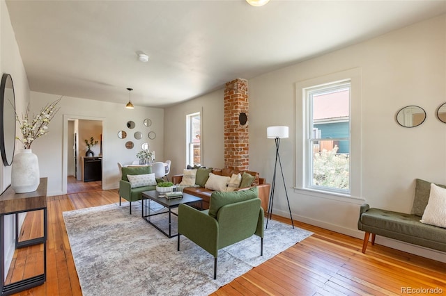 604 W 1st St, Salida, CO 81201 - living room with plenty of natural light, light wood-style flooring, and baseboards