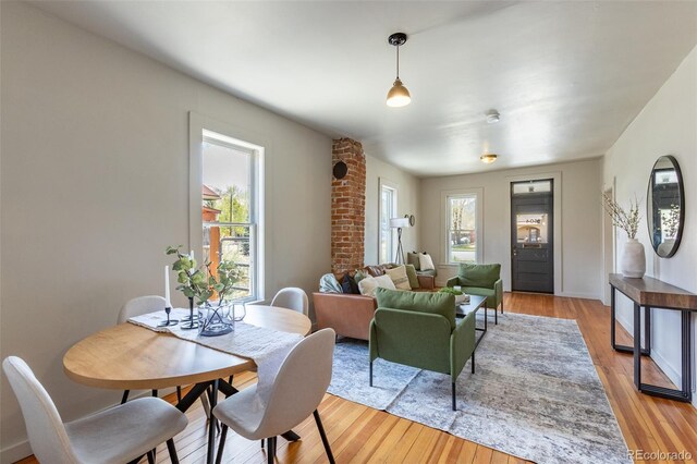 604 W 1st St, Salida, CO 81201 - dining space with plenty of natural light and light wood-style flooring