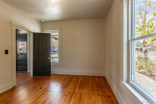 604 W 1st St, Salida, CO 81201 - empty room with hardwood / wood-style flooring and baseboards