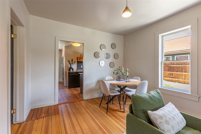 604 W 1st St, Salida, CO 81201 - dining room with light wood-style floors and baseboards