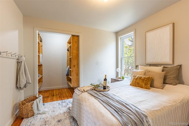 604 W 1st St, Salida, CO 81201 - bedroom featuring wood finished floors and baseboards