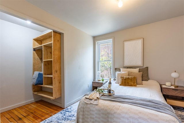 604 W 1st St, Salida, CO 81201 - bedroom with hardwood / wood-style floors and baseboards